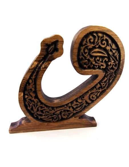The letter Vav carved from natural wood is decorated with LED lamp and wireless.