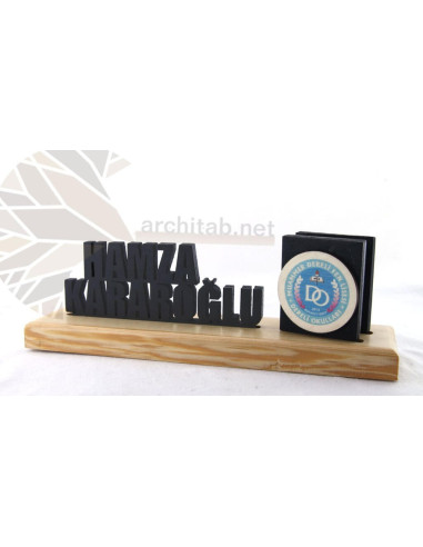 Check out our range of natural wood 3D table name holders. Architab