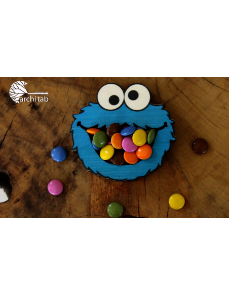 The natural wooden candy plate in the shape of Cookie Monster is so cute! Click