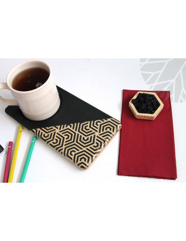 We combined the weight of black with the natural warmth of wood Wooden plate