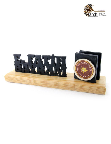 Check out our range of natural wood 3D table name holders. Architab